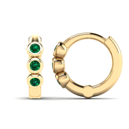 Gold Huggie Earrings With Emeralds