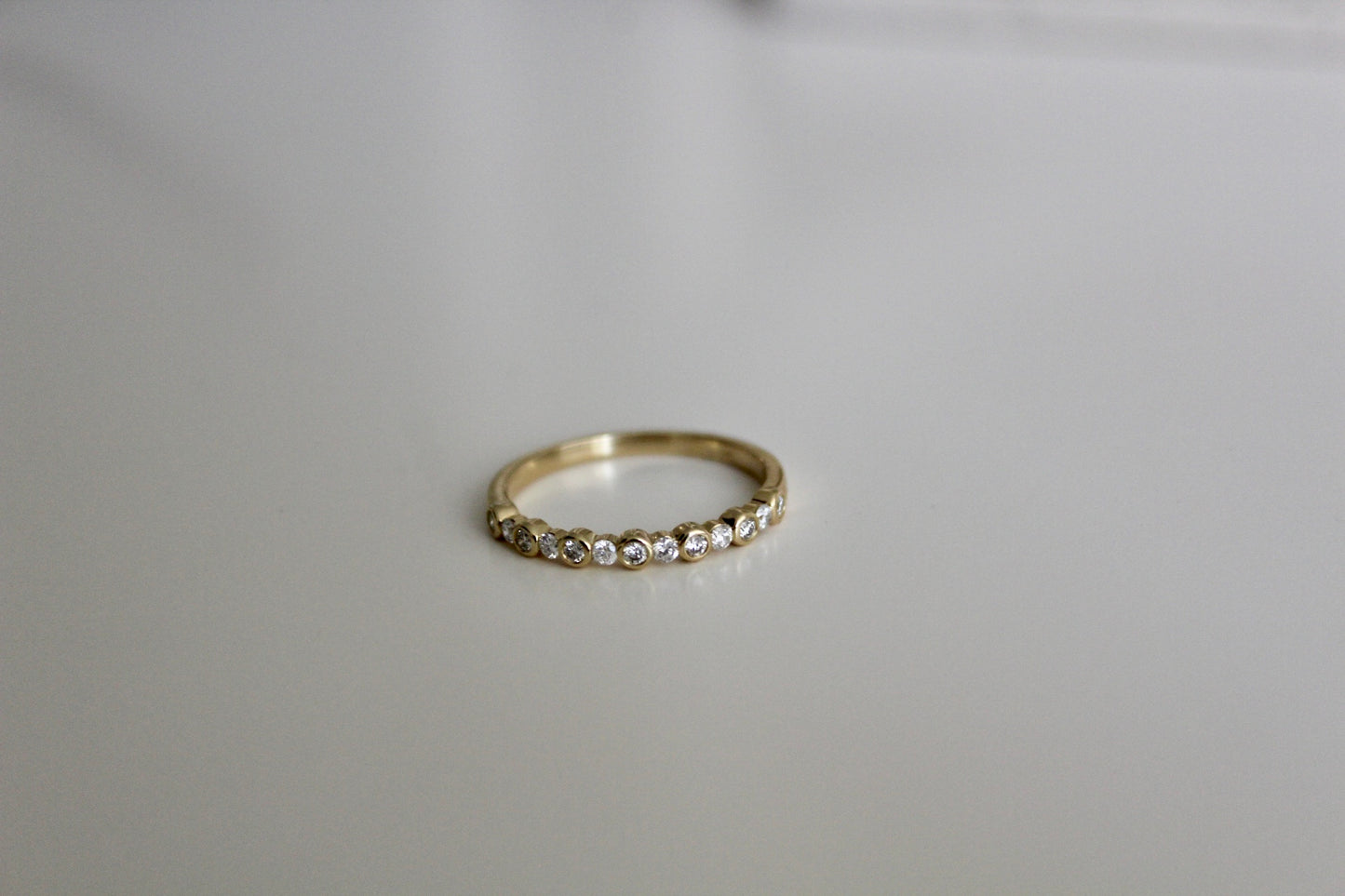 Gold Ring With Bezel Set Diamonds