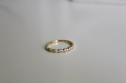 Gold Ring With Bezel Set Diamonds